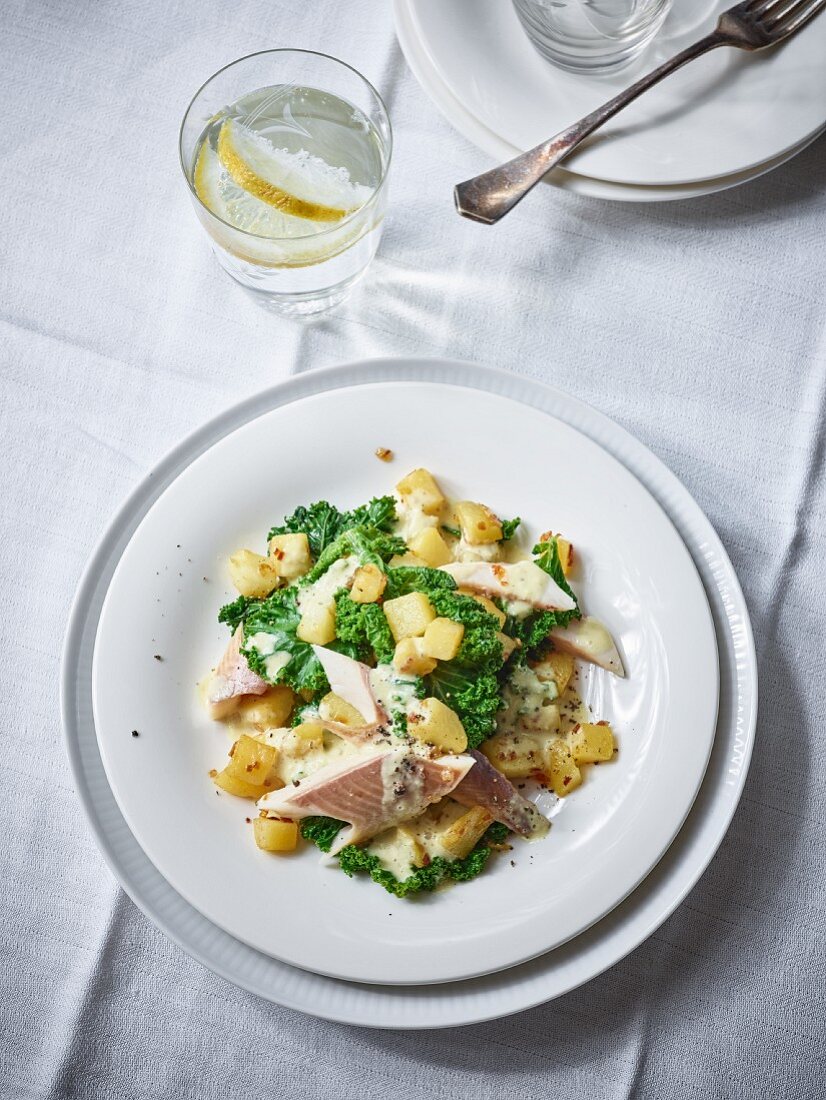 Potato and green cabbage ragout with smoked trout