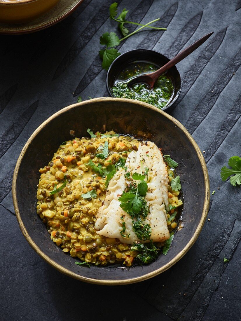 Lentil curry with a fried cod fillet