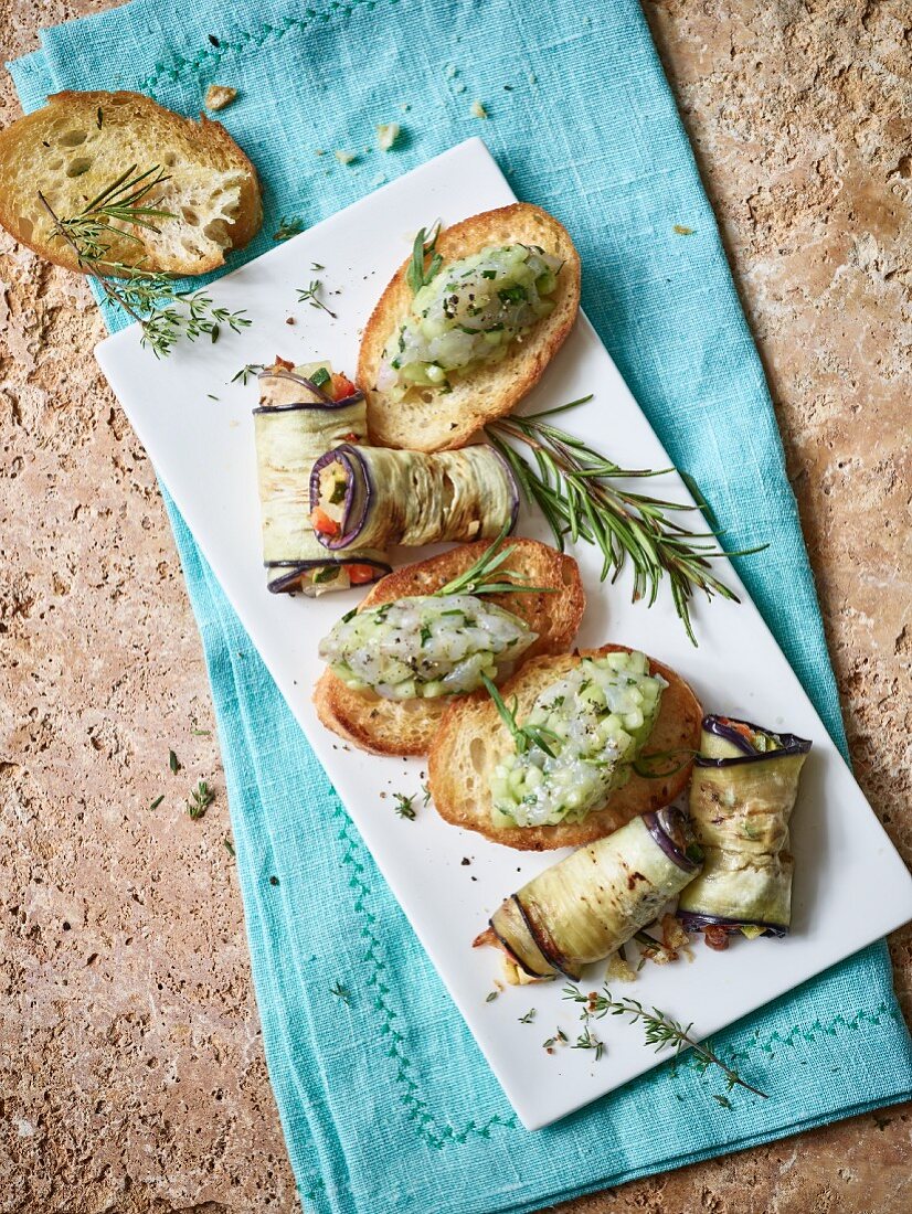Aubergine rolls and crostini with shrimp tartare