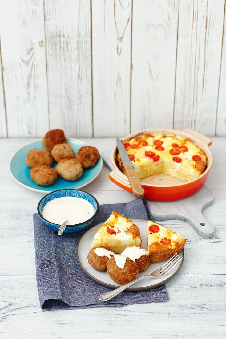 Chicken balls with potato fritatta and garlic sauce