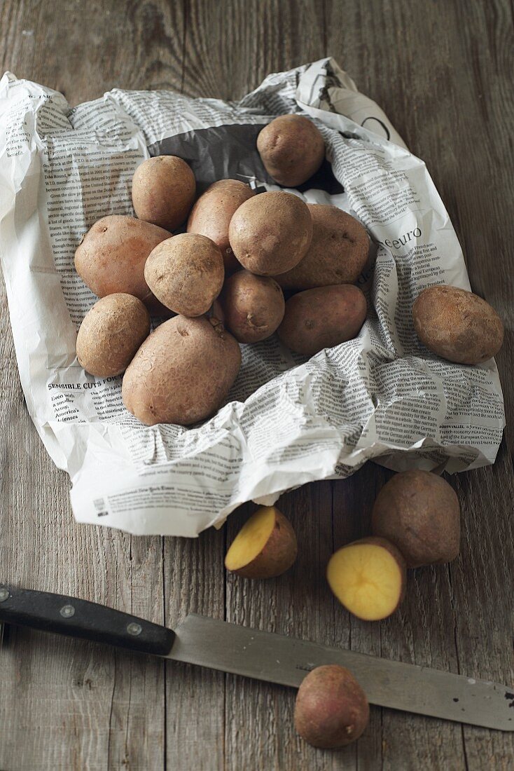 A pile of potatoes on paper