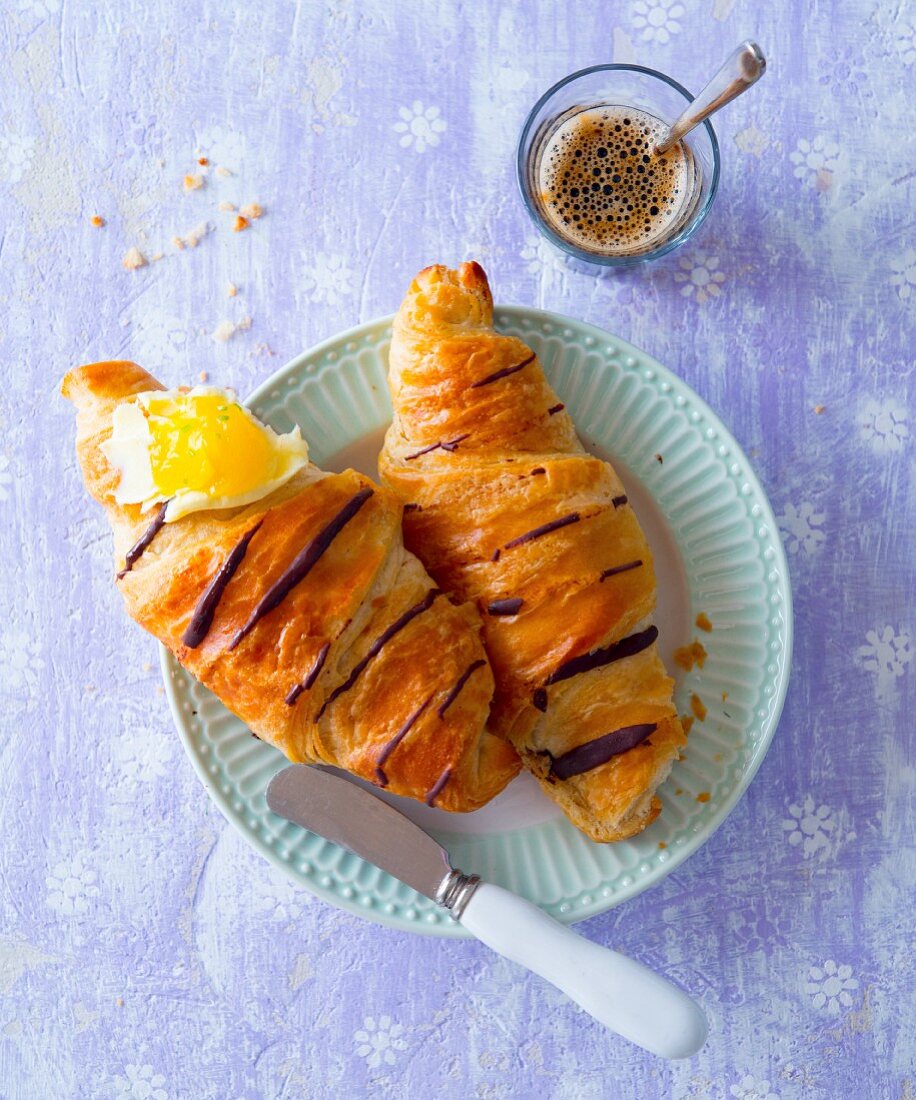 Chocolate croissants with butter and passion fruit jam