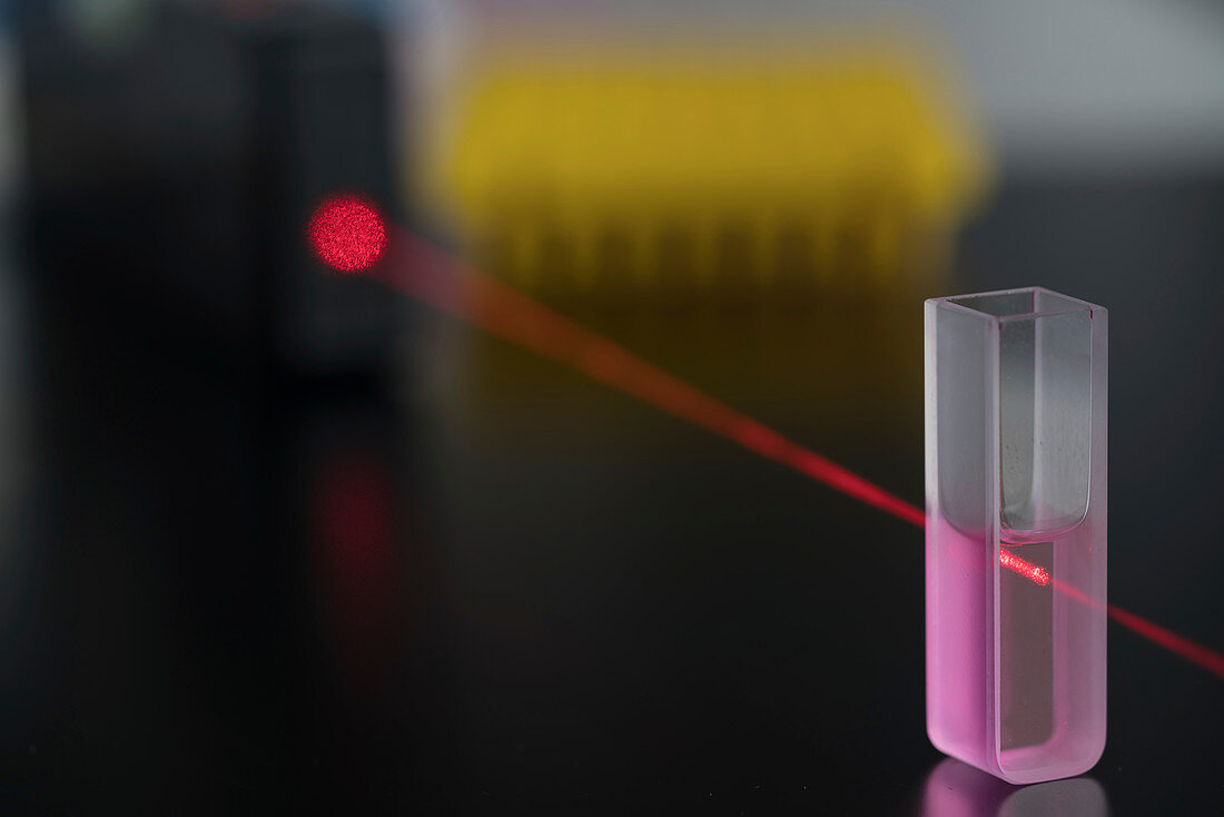 Cuvette with red laser beam