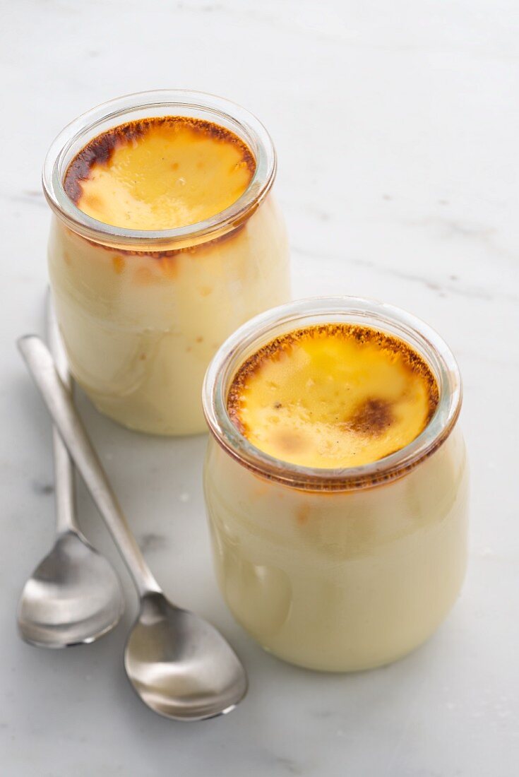 Cream a la vanille (baked vanilla cream, France) in jars
