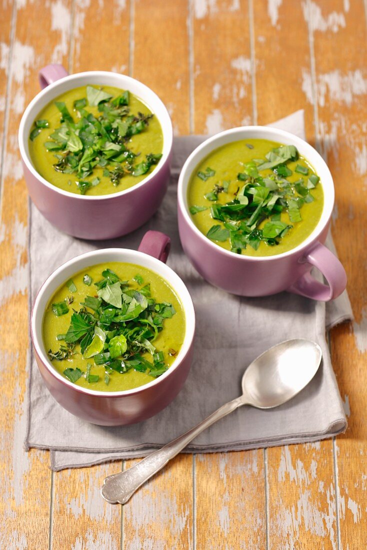 Green asparagus soup with spinach and herbs
