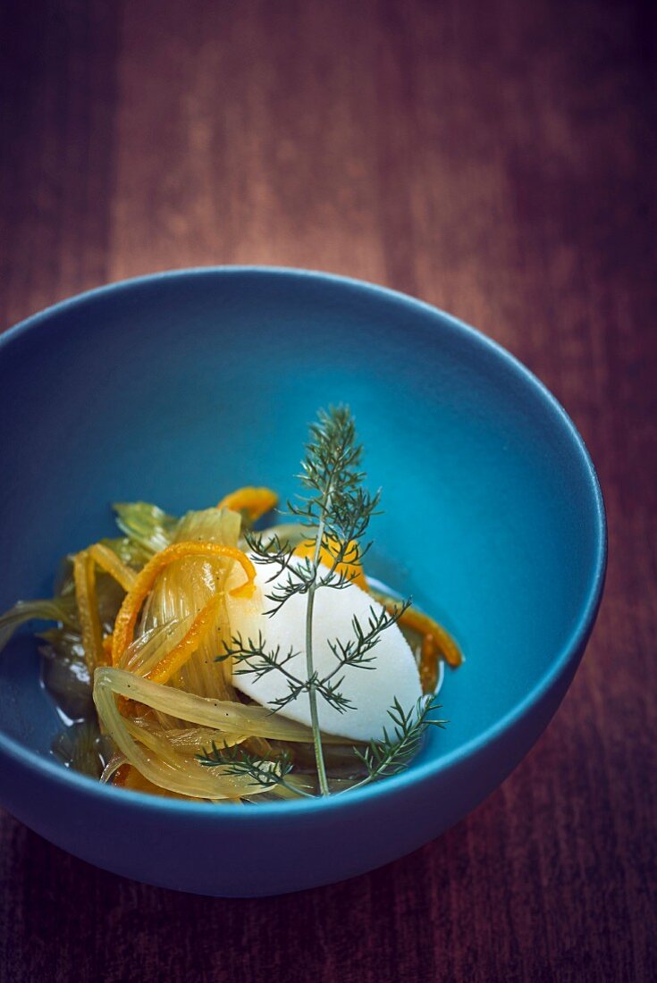 Lemon ice cream with fennel confit in a bowl