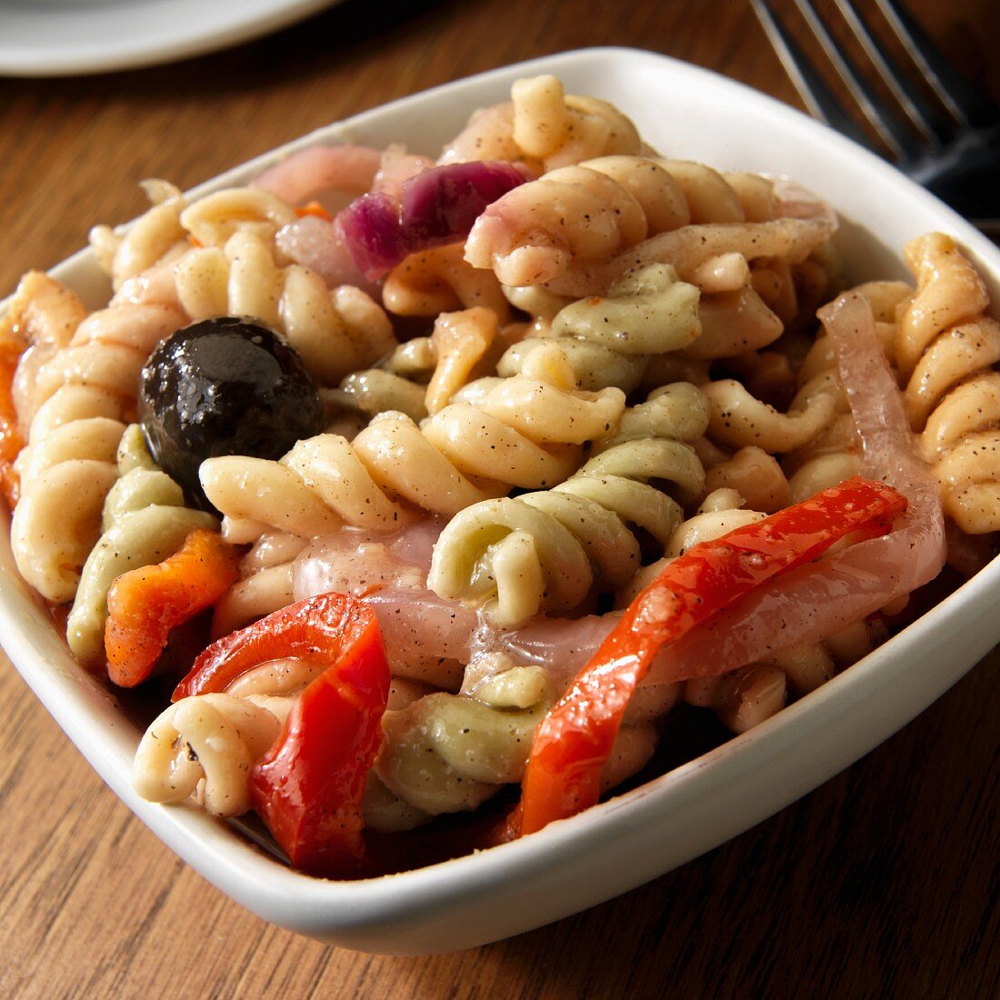 Rotini Pasta salad with olives, peppers, onions