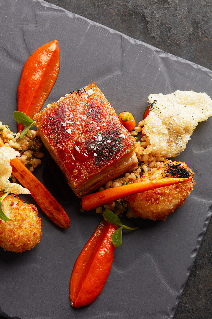 Crispy pork belly with carrots