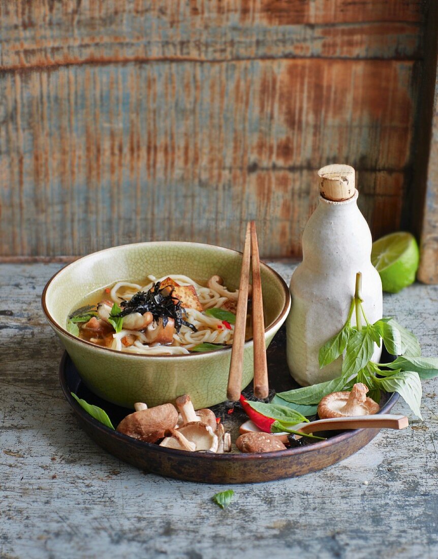 Asian soup with shiitake mushrooms, algae and tofu