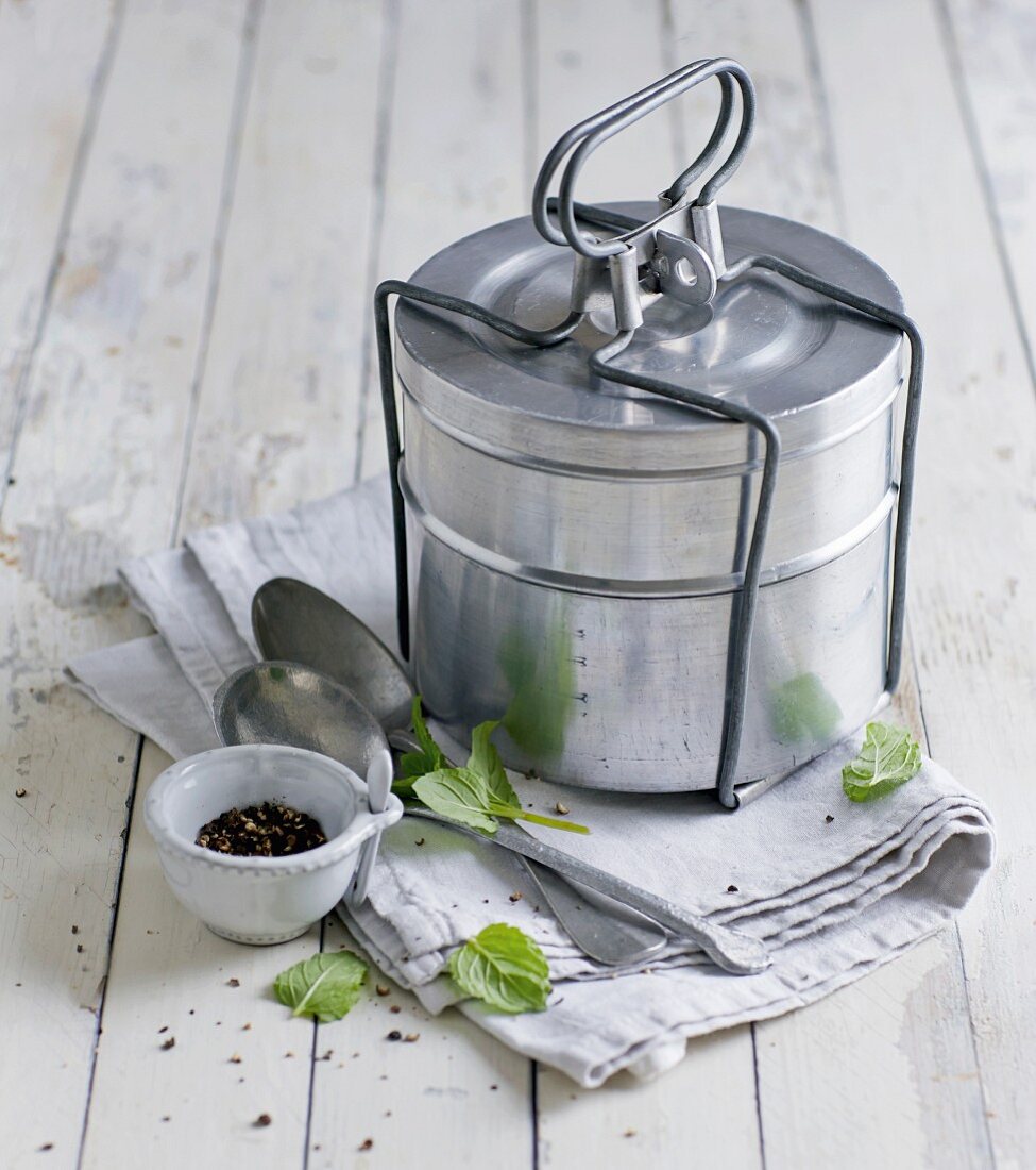 A Tiffin carrier, practical for transporting soup