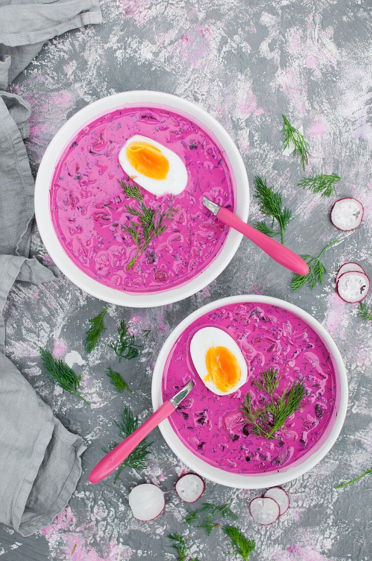 Cold soup made with kefir, yoghurt, sour cream and beet root, served with boiled egg