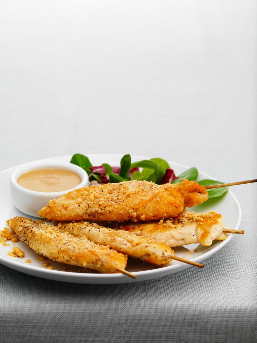 Chicken skewers with a peanut dip