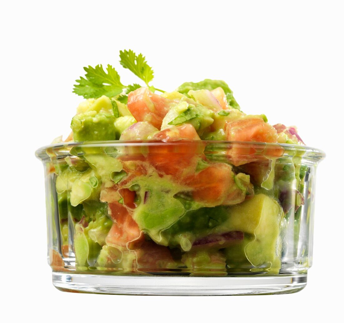 Guacamole in a small glass bowl