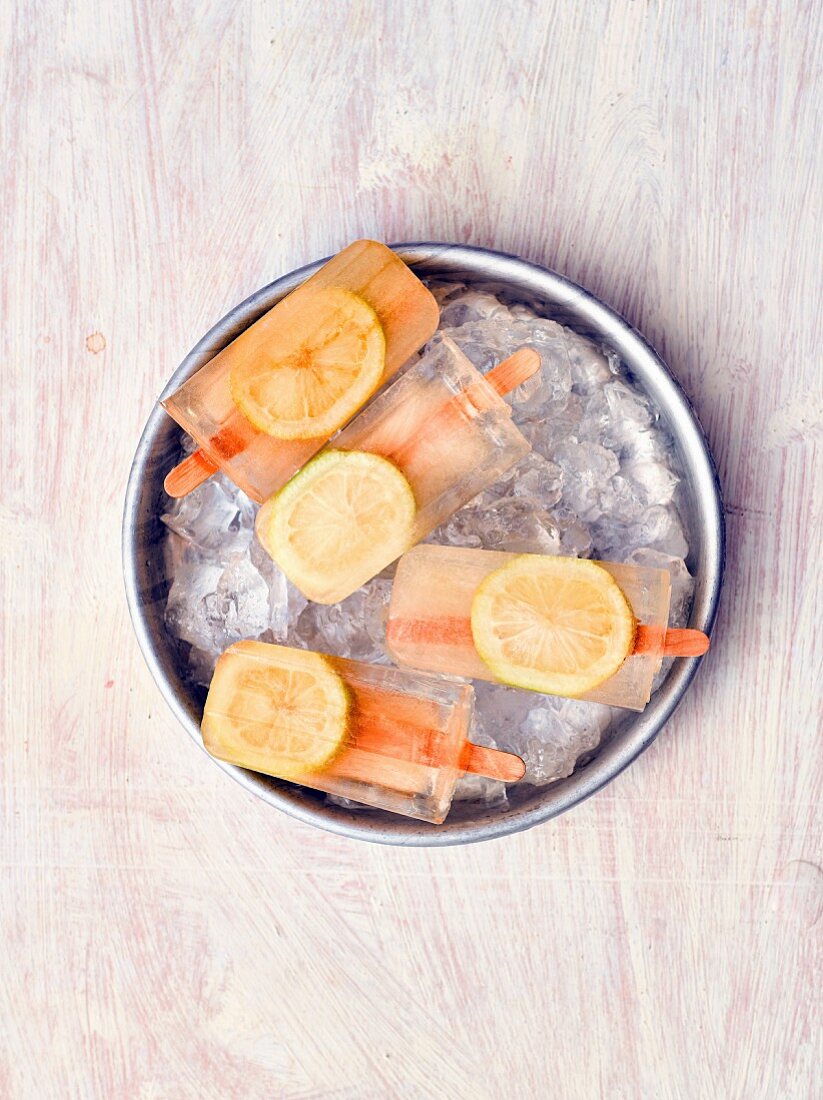 Homemade lemon popsicles on sticks