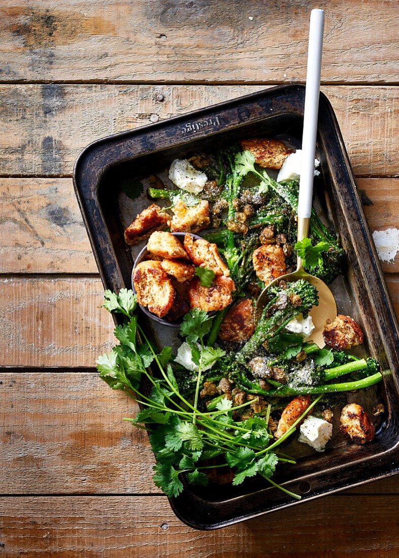 Broccolini with crunchy roasted capers, rustic croutons and goat's cheese