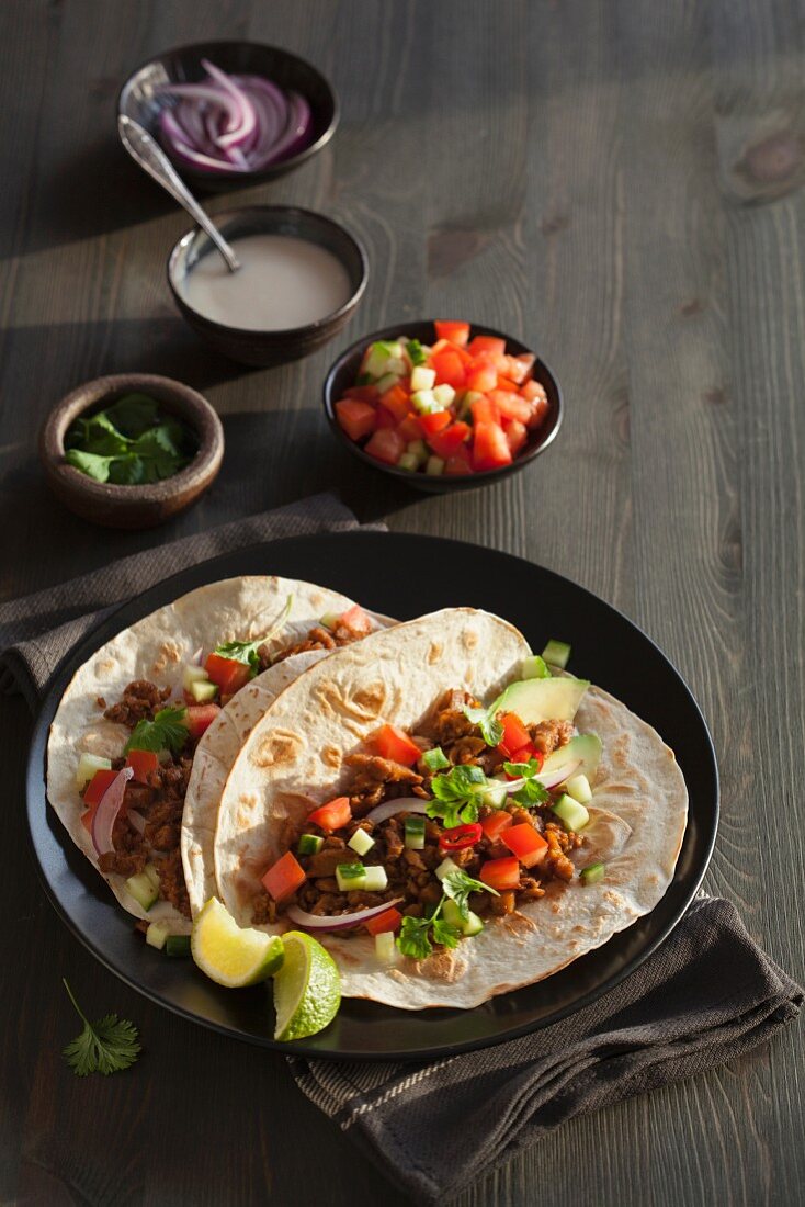 Vegan tortilla with beefy crumble from pea protein and vegetables