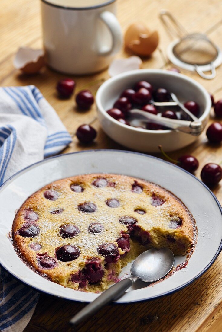 Cherry clafoutis on a rustic wooden table