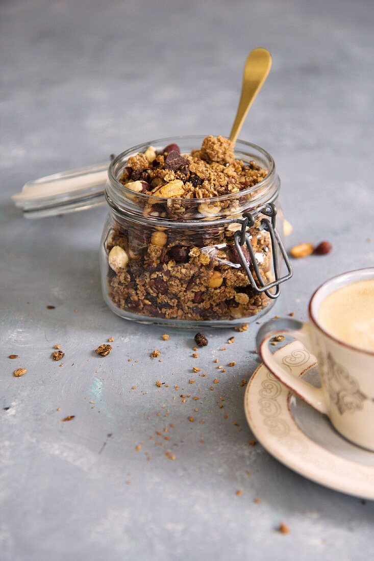 Granola with chocolate in a glass jar