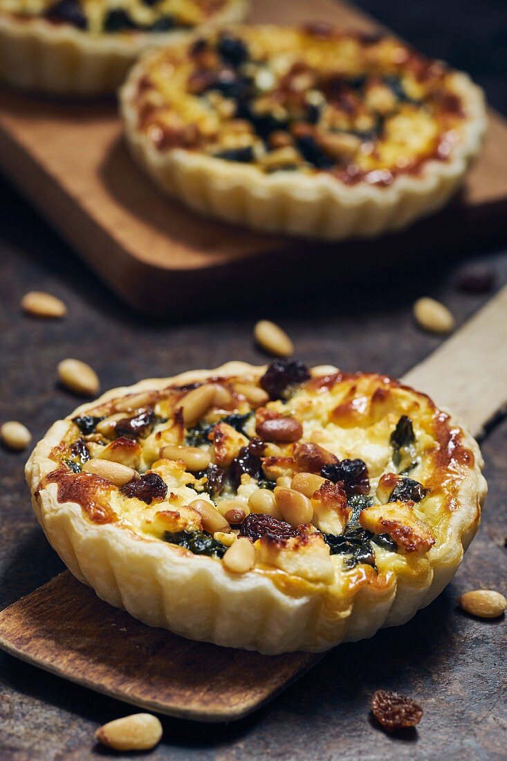 Spinach pie with sheep's cheese, raisins and pine nuts