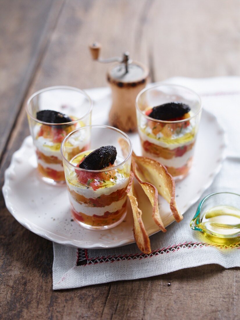Tomato and goat's cheese trifle in glasses