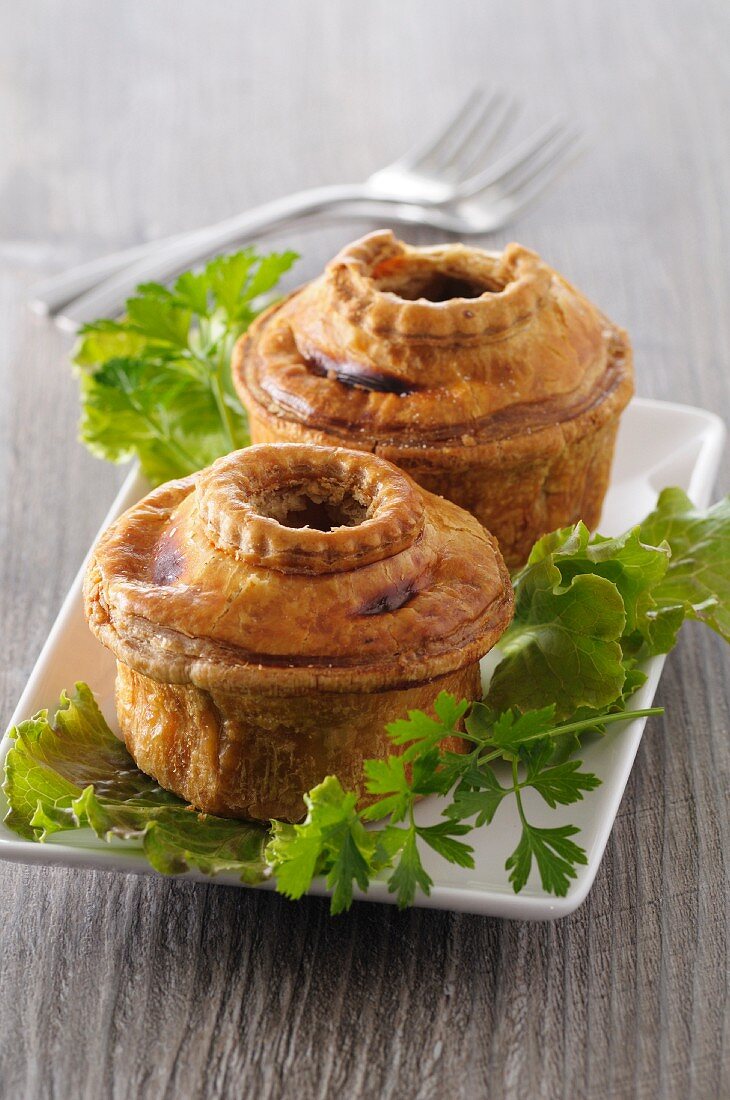 Small pies with a salad garnish
