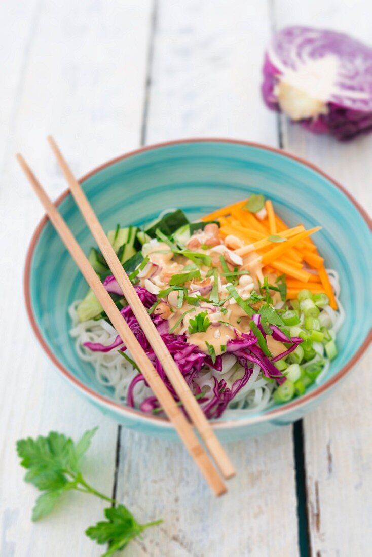 Rice noodle salad with vegetables and peanut sauce
