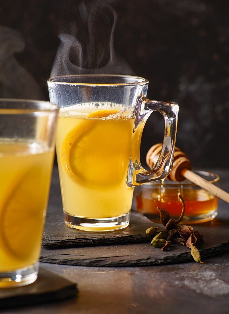 White mulled wine with oranges and honey
