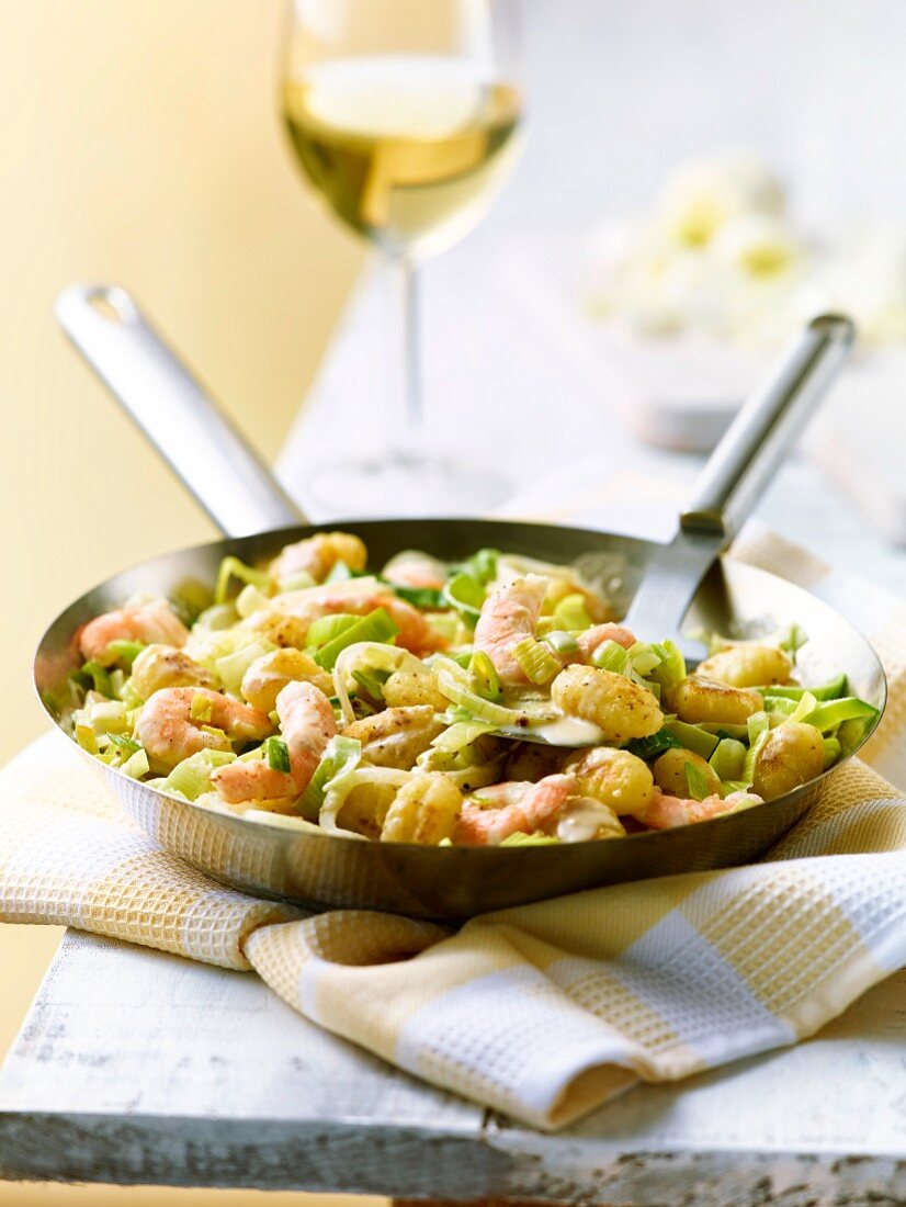 Pan fried gnocchi and leeks with prawns