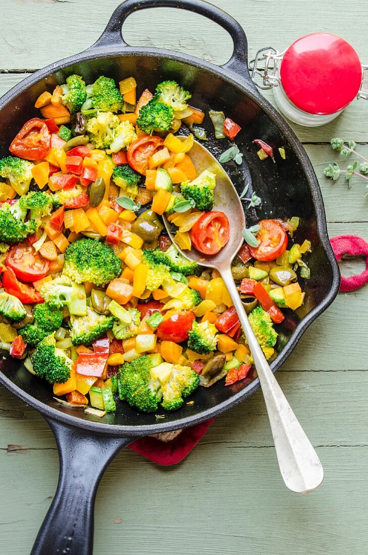 Colourful pan fried vegetables with turmeric