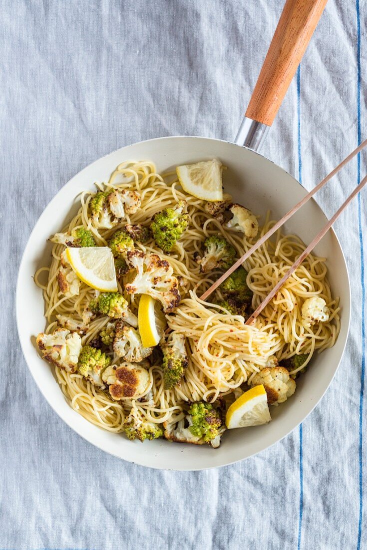 Spaghetti with romanesco, cauliflower and lemon