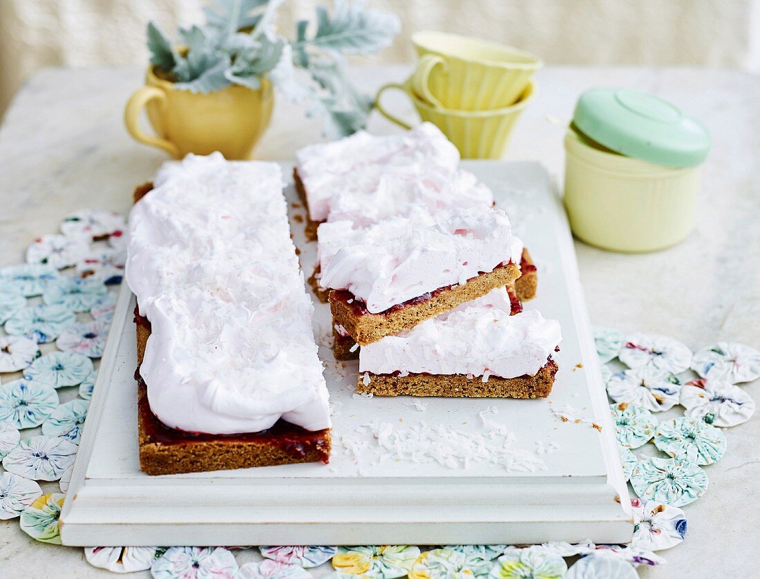 Semolina cake from the tray with jam and marshmallow cream