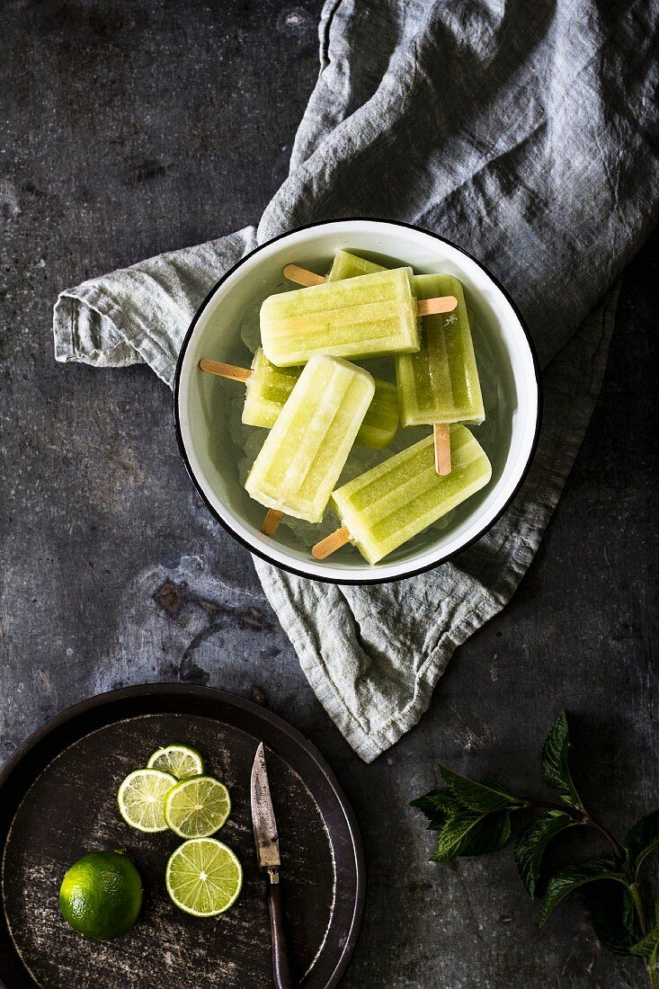 Homemade ice lollies with cucumber and lime