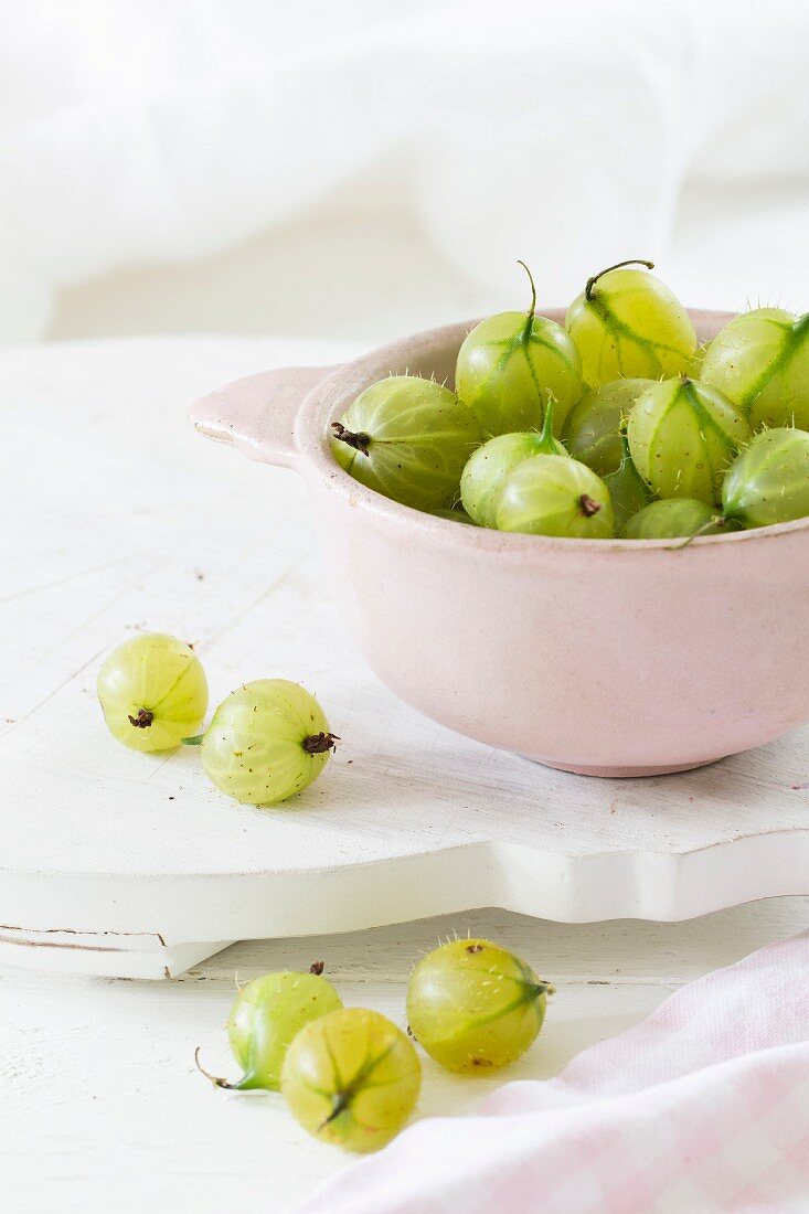 Green gooseberries in a bowl