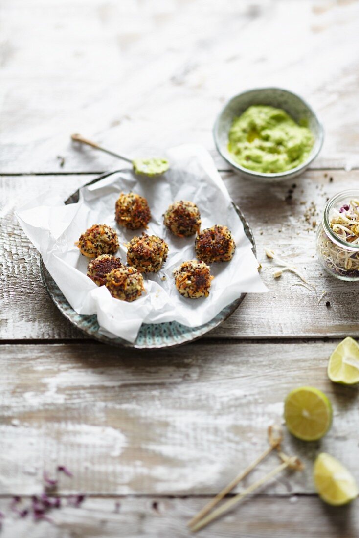 Quinoa and carrot balls with a lime and avocado dip