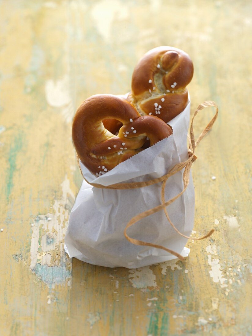 Lye pastries in a white bag