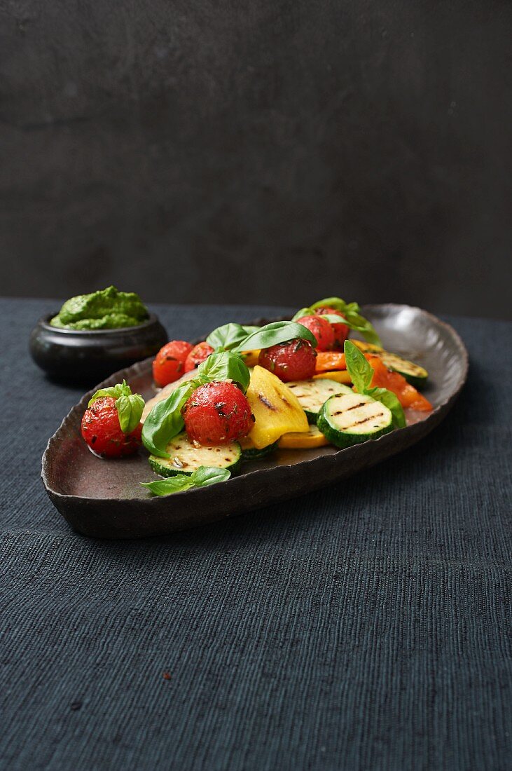 Grilled vegetables with pesto and basil