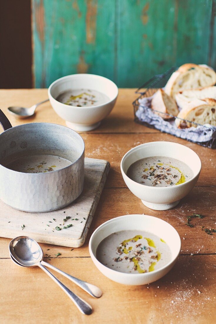 Wild mushroom soup with fresh thyme and crusty sourdough bread