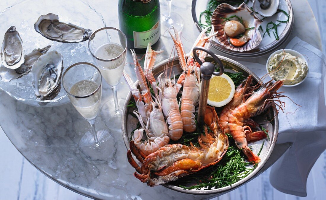 A seafood platter with sparkling wine