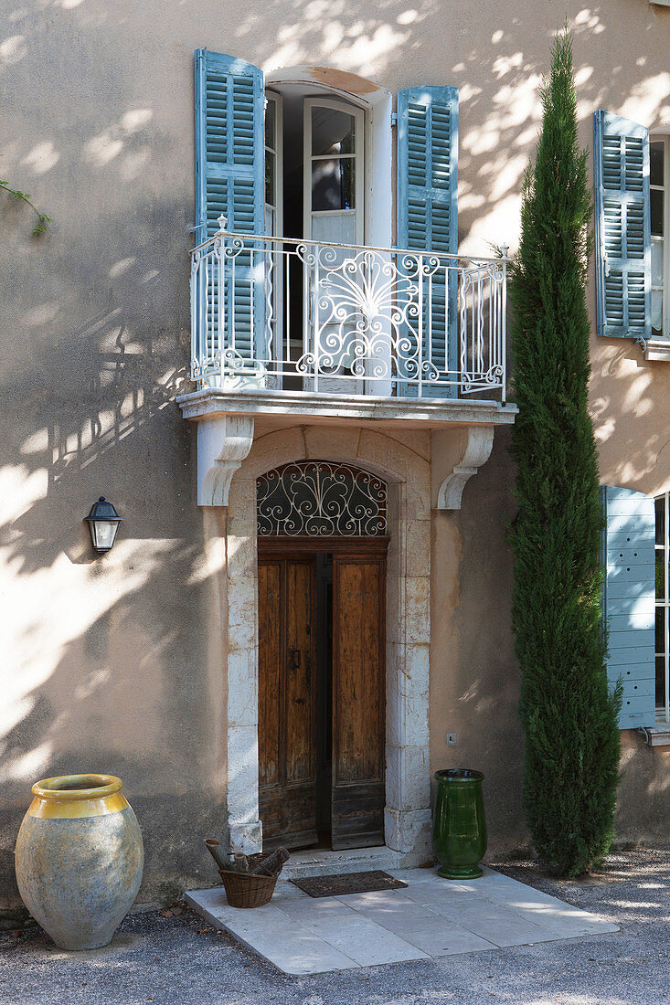 Balcony above old front door of Mediterranean country house