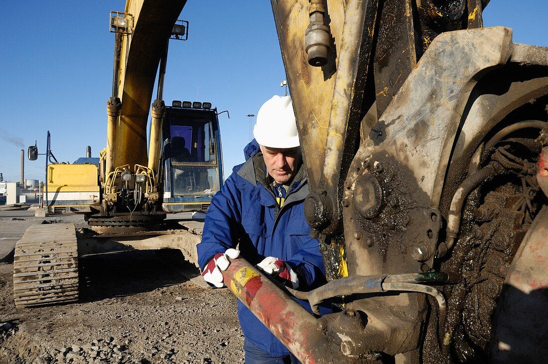 Man operating bulldozer