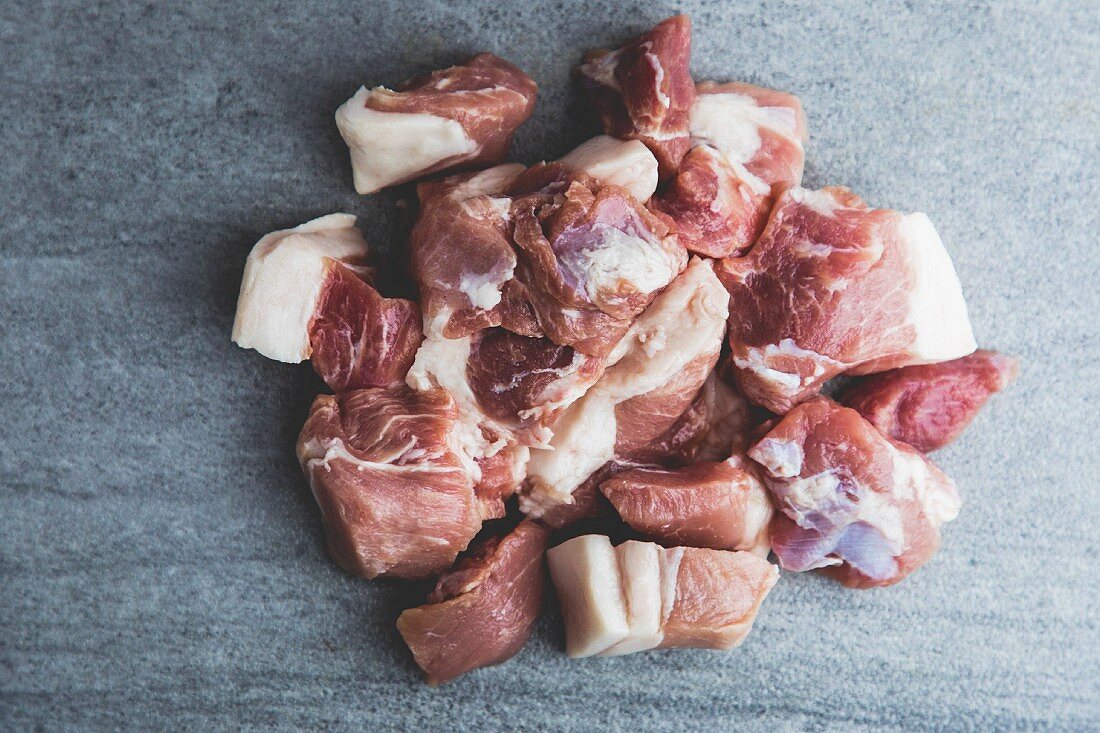 Raw organic pork meat for goulash (seen from above)
