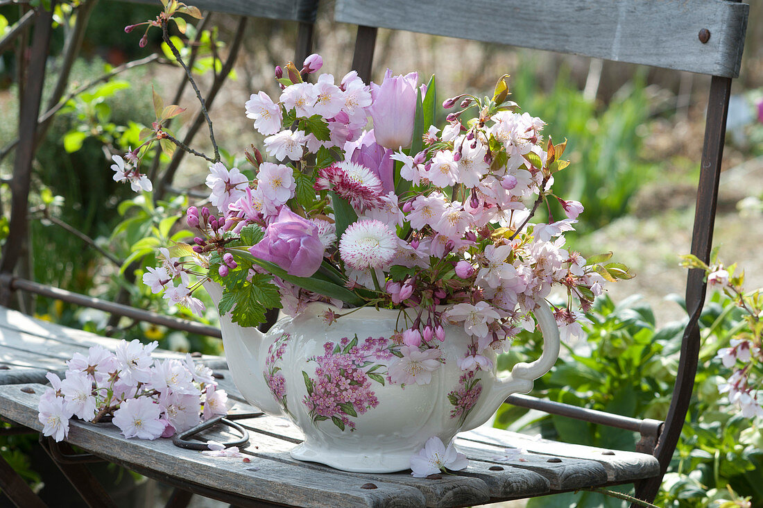 Romantic spring bouquet in grandmas old coffee pot