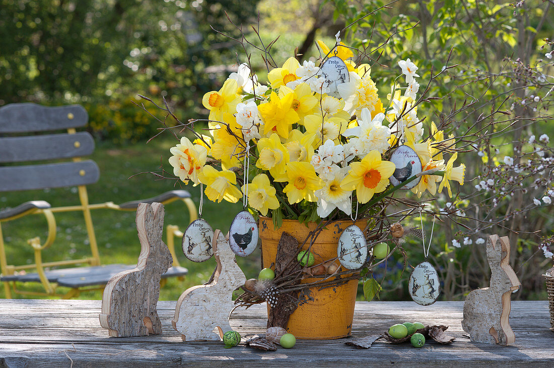 Narcissus bouquet decorated with twigs and bark