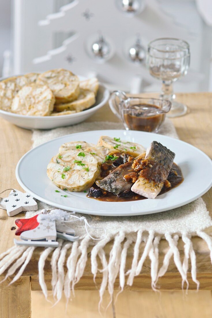 Carp with prunes and napkin dumplings