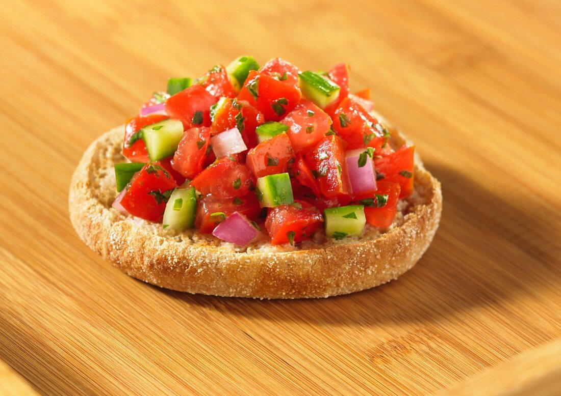 English muffin topped with salsa