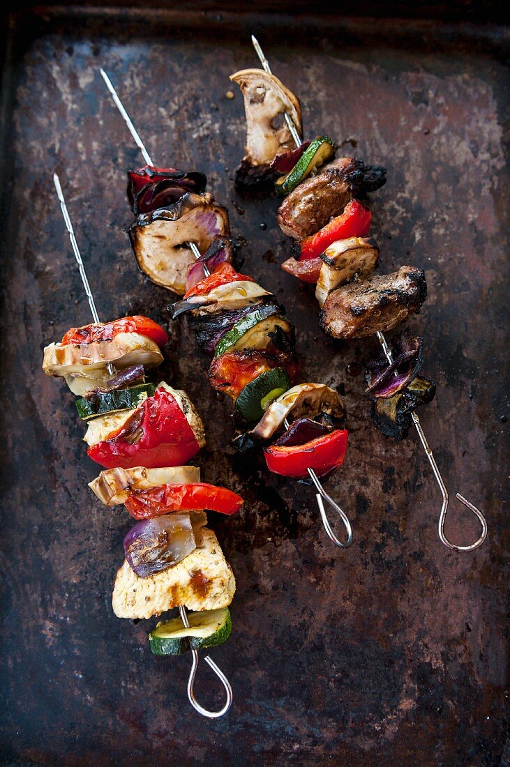 Chicken and lamb skewers with vegetables