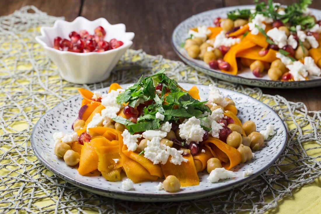 Carrot salad with chickpeas, feta and pomegranate seeds