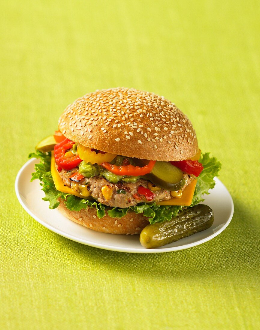 Turkey burger topped with peppers