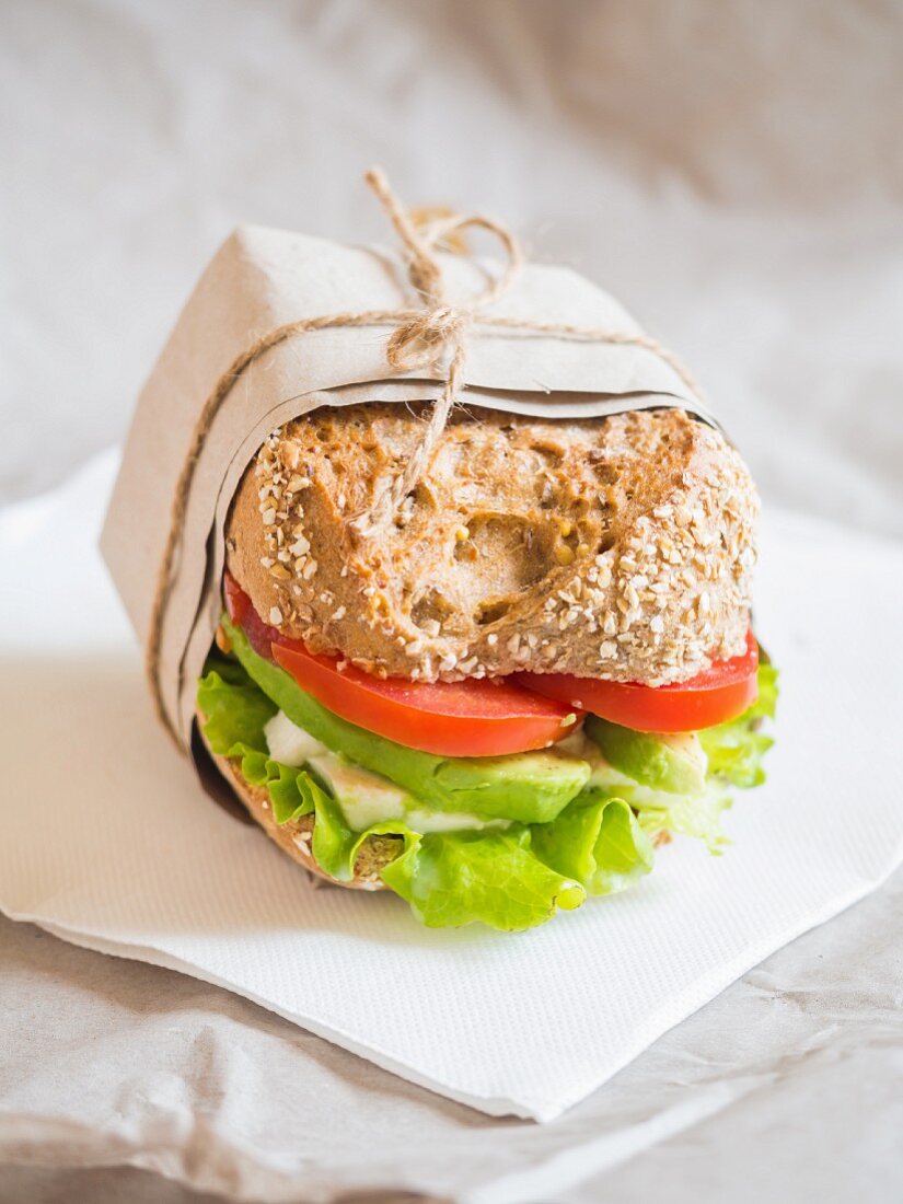 Fresh vegetarian goat cheese and vegetable sandwich on a whole grain bread