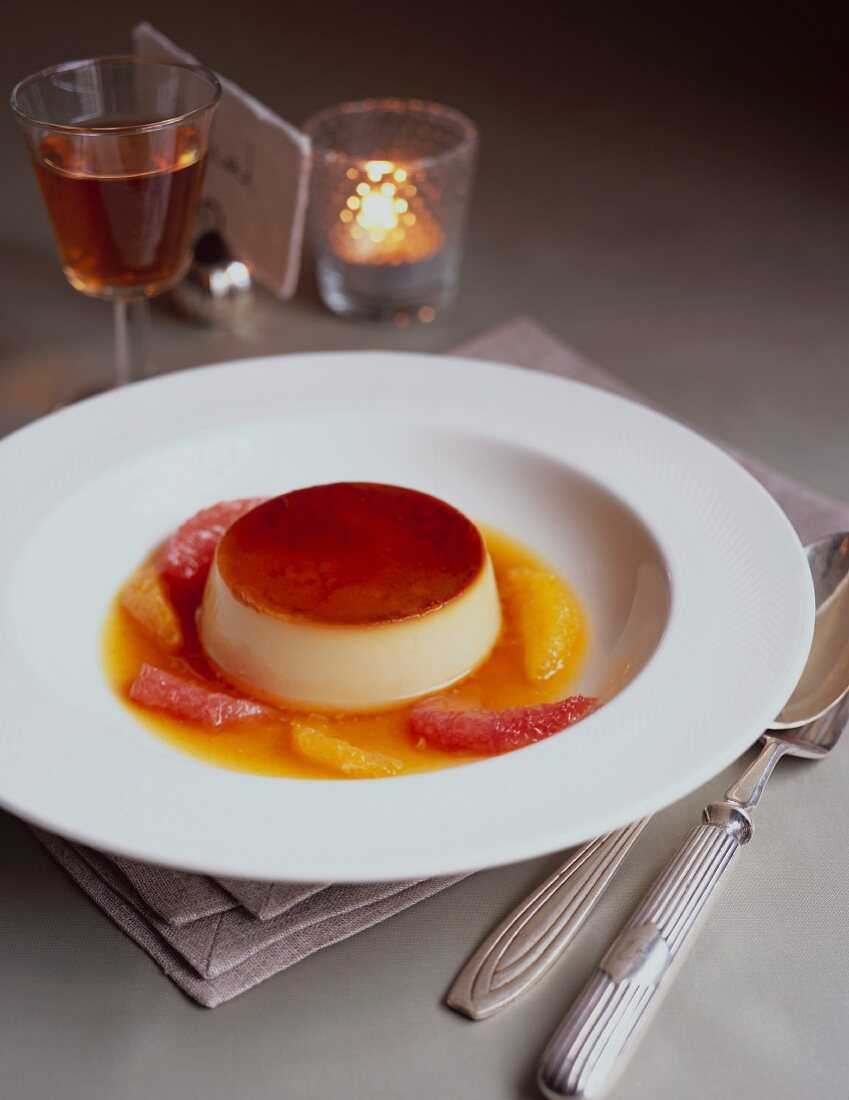 Creme caramel with orange slices